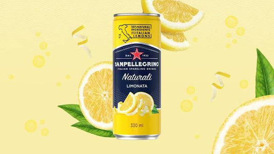 Sanpellegrino Natural Lemonata can with lemon slices on a yellow background